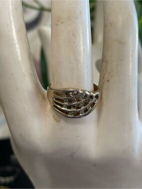 Elegant Gold Tone Wave Ring with Accent Stones